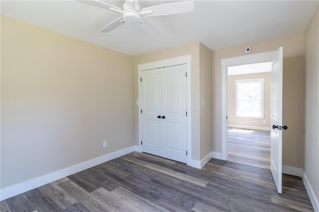 96 Orchard Road Summerville, GA 30747 - Photo 8 of 14 a view of an empty room with wooden floor