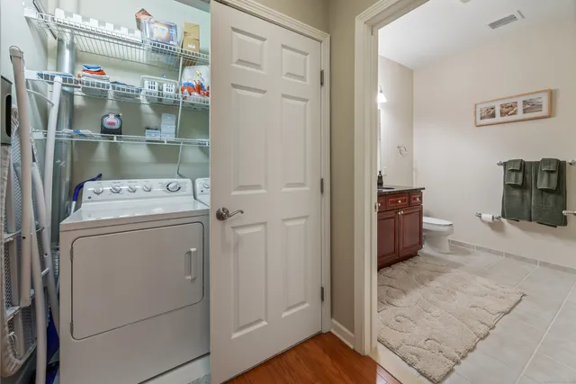 a utility room with dryer and washer