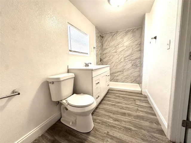a bathroom with a sink and a toilet