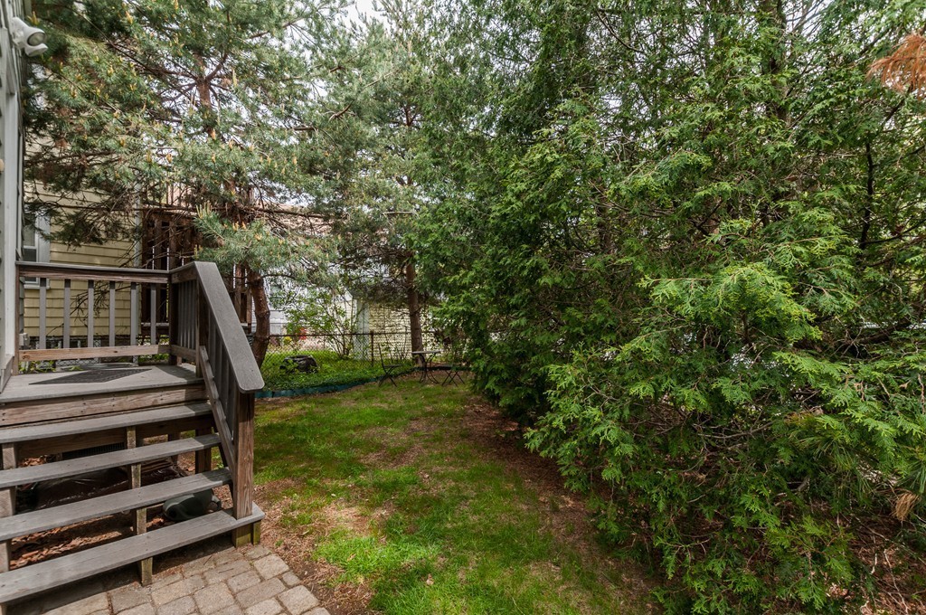38 Lafayette Street, Unit 38 Arlington, MA 02474 - Photo 12 of 13 a view of outdoor space with deck and garden