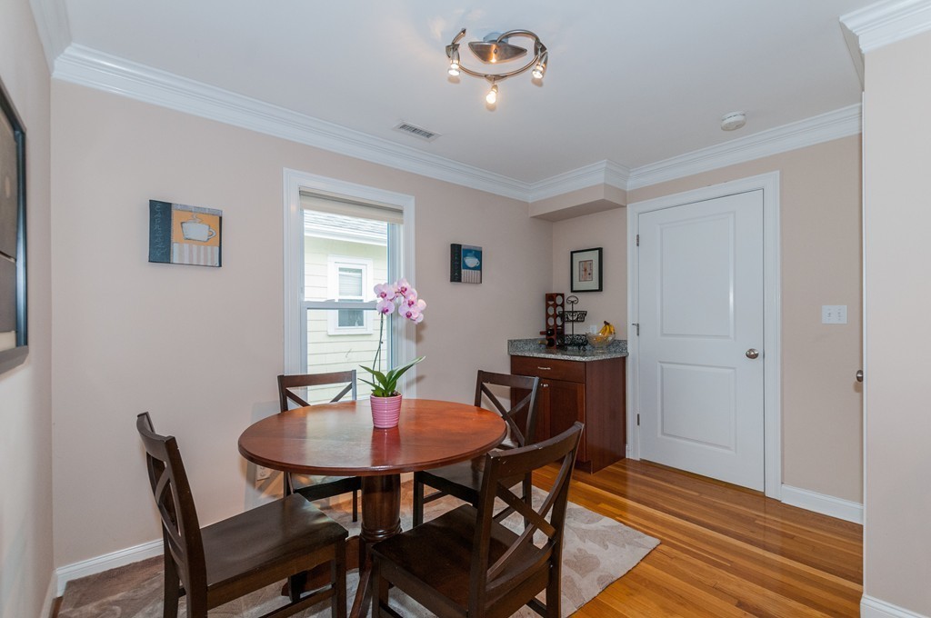 38 Lafayette Street, Unit 38 Arlington, MA 02474 - Photo 5 of 13 a view of a dining room with furniture and window