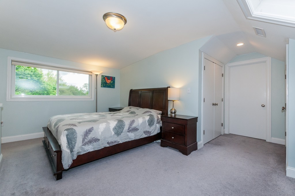 38 Lafayette Street, Unit 38 Arlington, MA 02474 - Photo 6 of 13 a bedroom with a bed and window