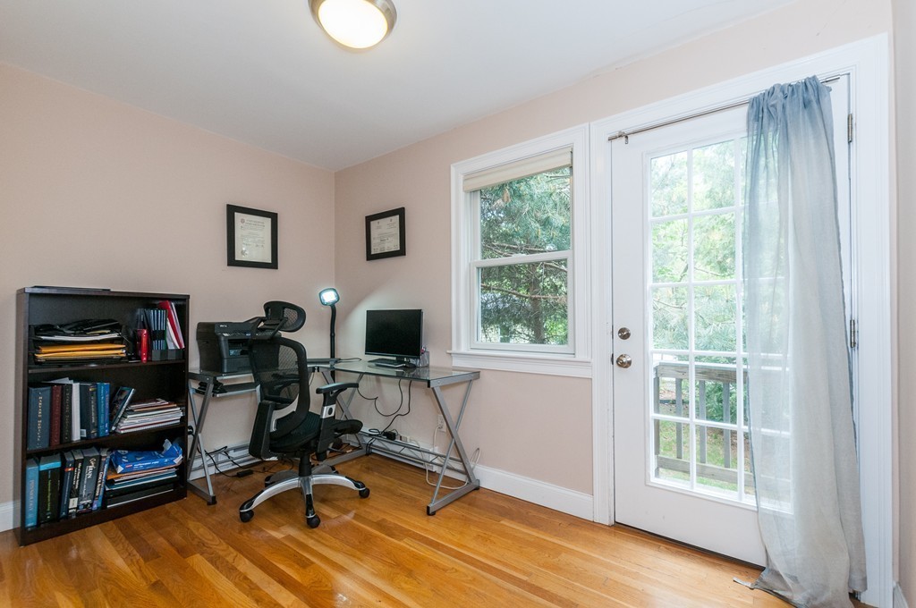 38 Lafayette Street, Unit 38 Arlington, MA 02474 - Photo 10 of 13 a view of a workspace with furniture and a window