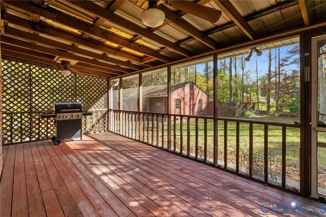 a view of a balcony with wooden floor
