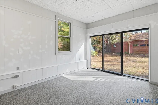 a kitchen that has a sink and a stove