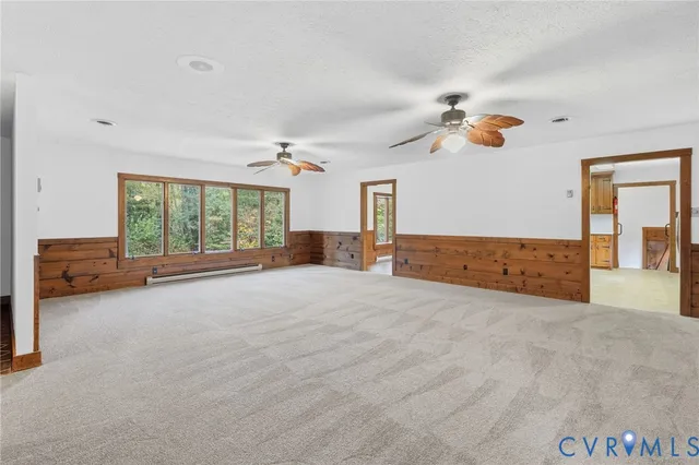 a view of livingroom with furniture and window