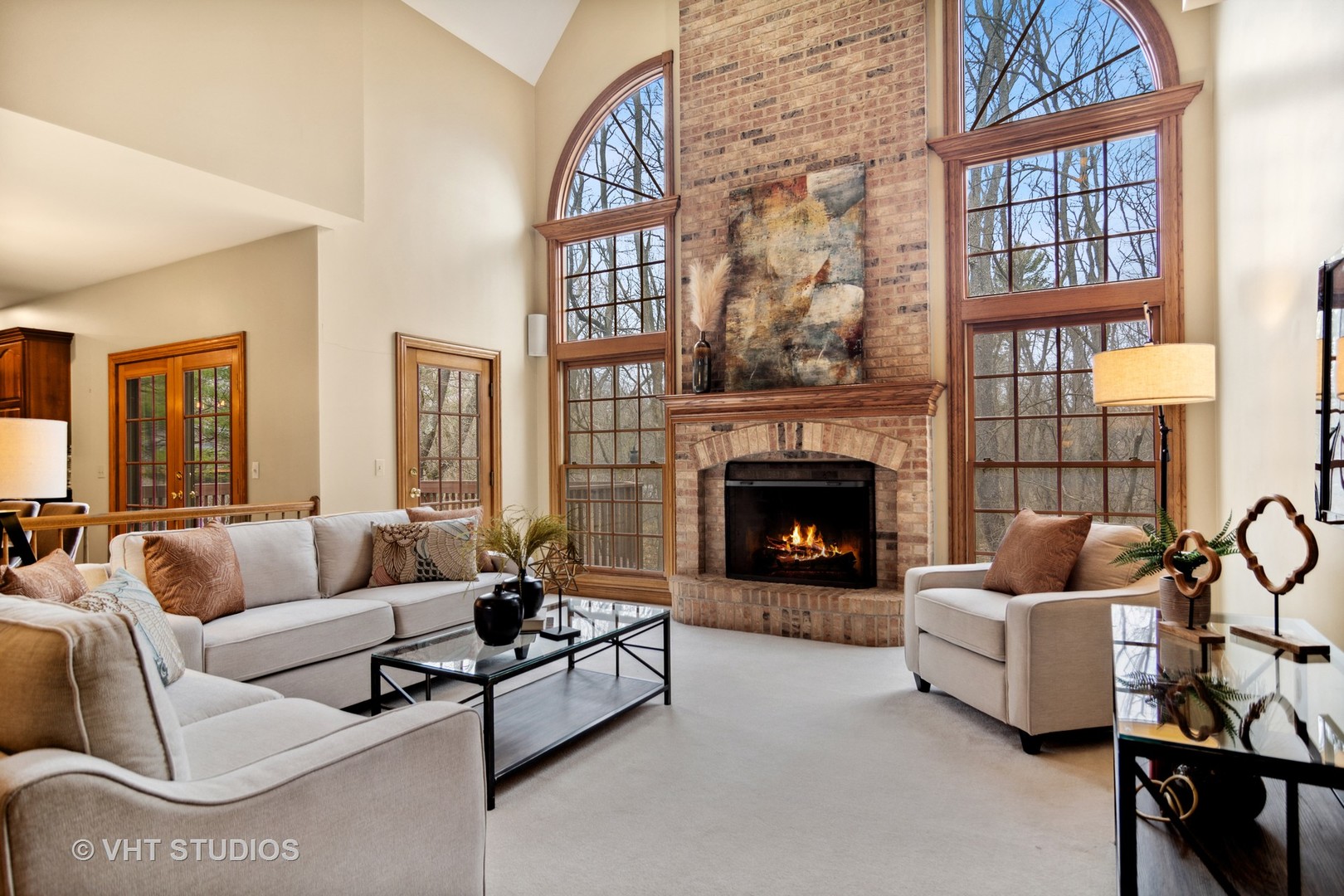 902 Bridle Lane Cary, IL 60013 - Photo 16 of 60 a living room with furniture and a fireplace