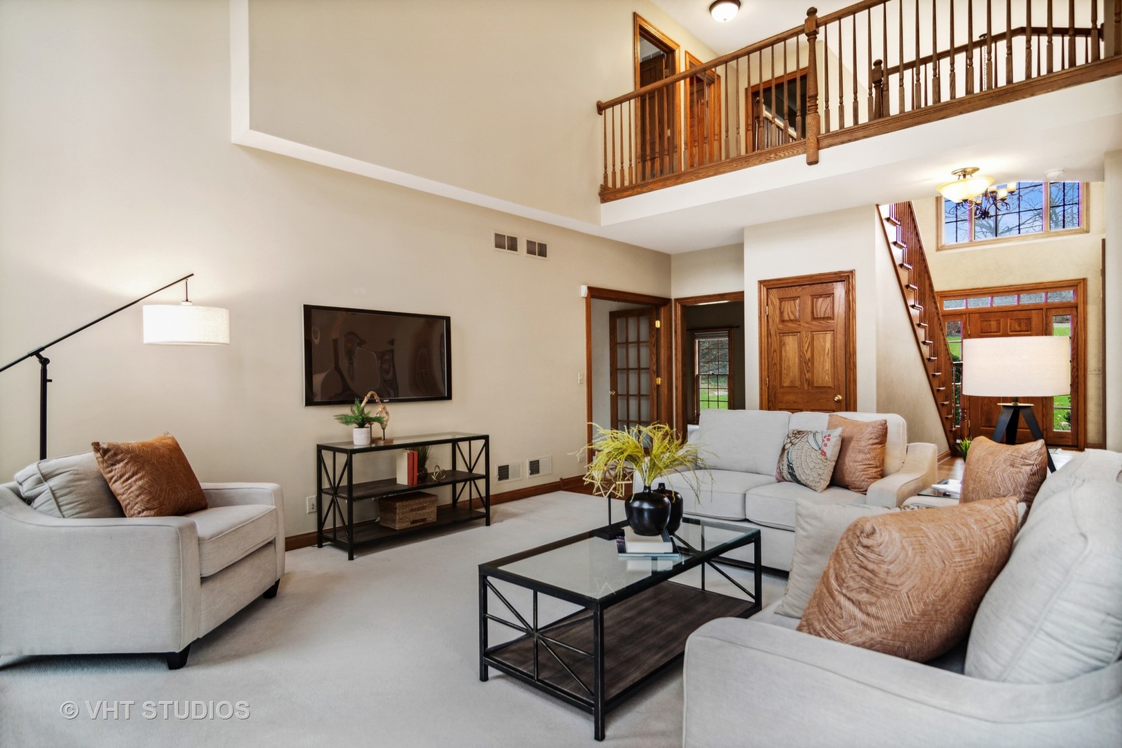 902 Bridle Lane Cary, IL 60013 - Photo 17 of 60 a living room with furniture and a flat screen tv