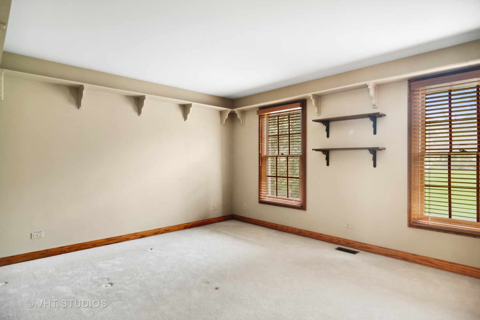 902 Bridle Lane Cary, IL 60013 - Photo 32 of 60 a view of an empty room with a window