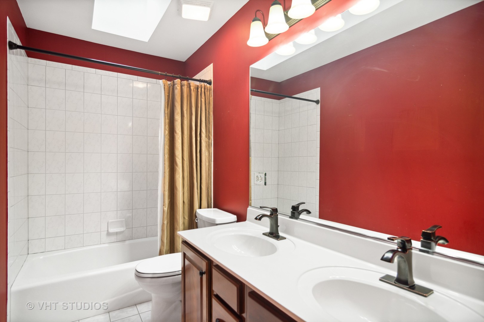 902 Bridle Lane Cary, IL 60013 - Photo 33 of 60 a bathroom with a sink and a mirror