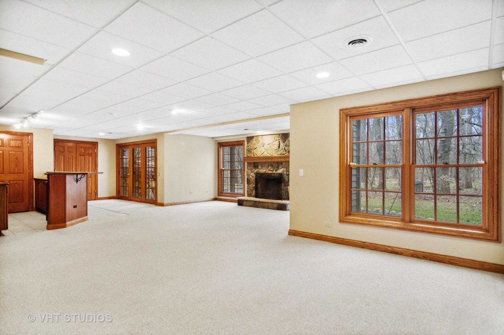902 Bridle Lane Cary, IL 60013 - Photo 40 of 60 a view of an empty room with a window and fireplace