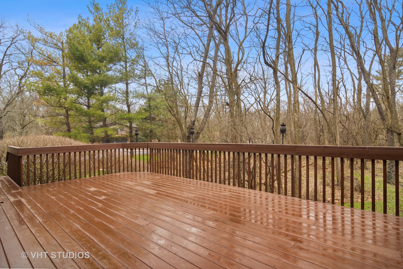 902 Bridle Lane Cary, IL 60013 - Photo 46 of 60 a balcony with wooden floor and fence