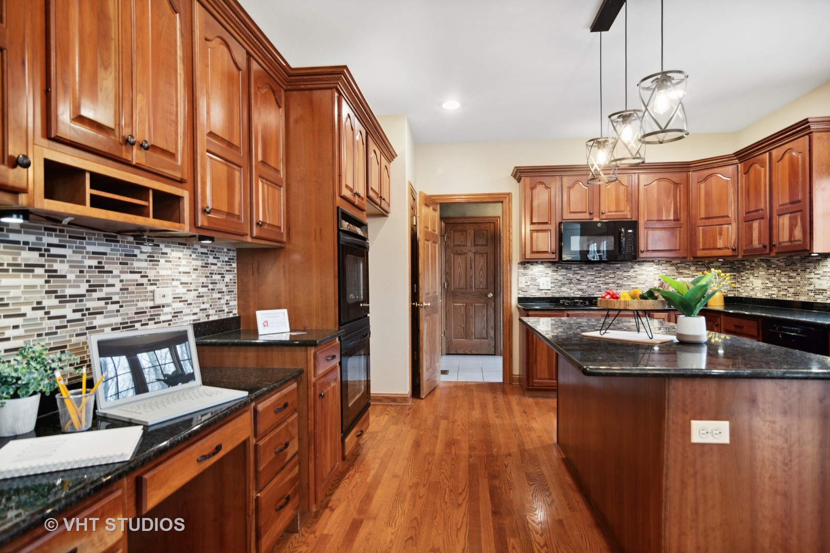 902 Bridle Lane Cary, IL 60013 - Photo 7 of 60 a kitchen with stainless steel appliances granite countertop a refrigerator a sink dishwasher a stove and a wooden cabinets