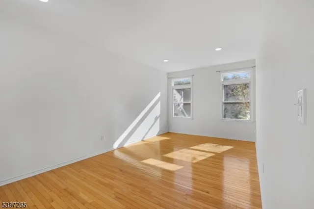 a view of a big room with wooden floor