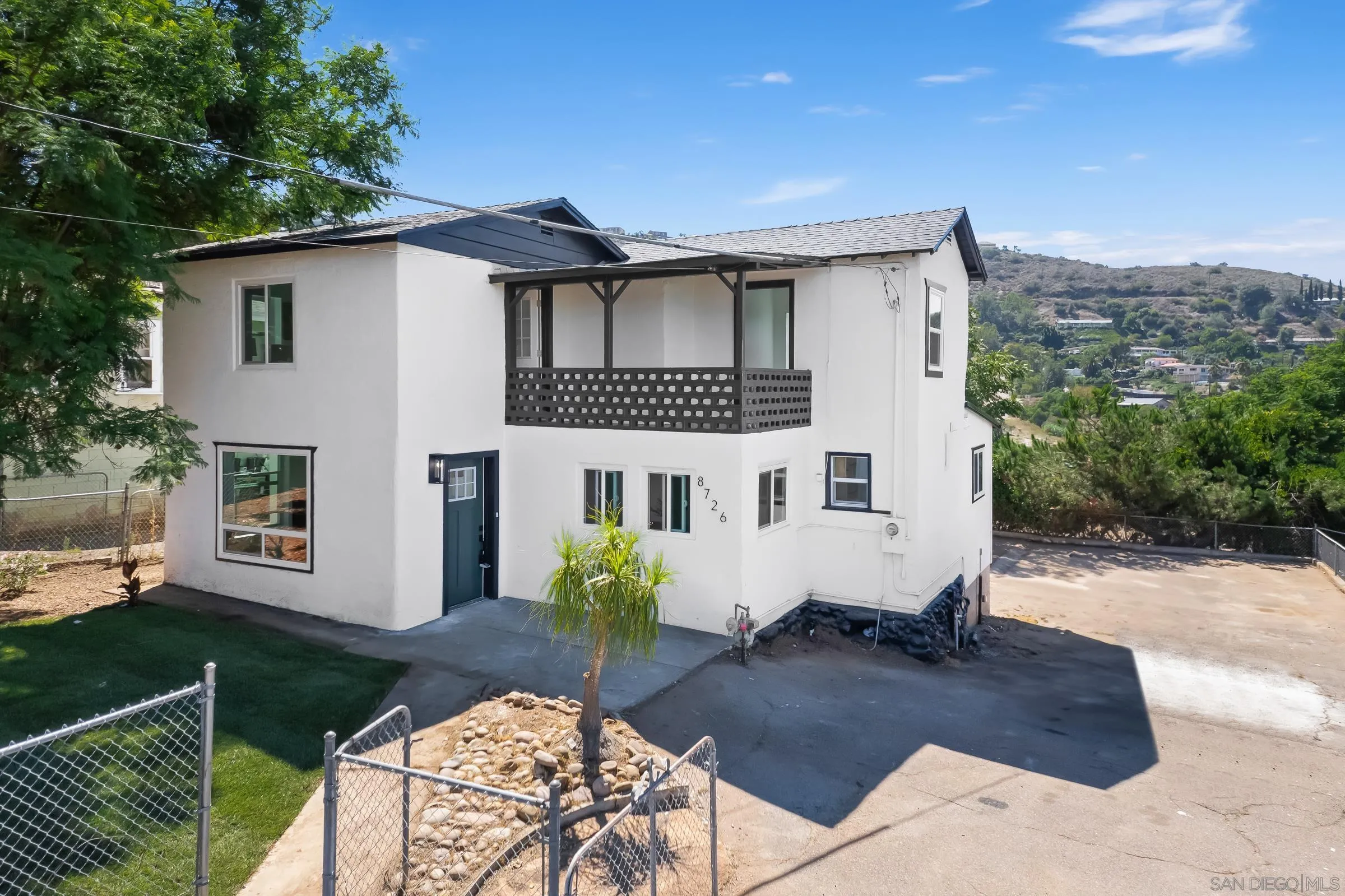 8726 Almond Road Lakeside, CA 92040 - Photo 2 of 31 a view of a house with backyard and sitting area