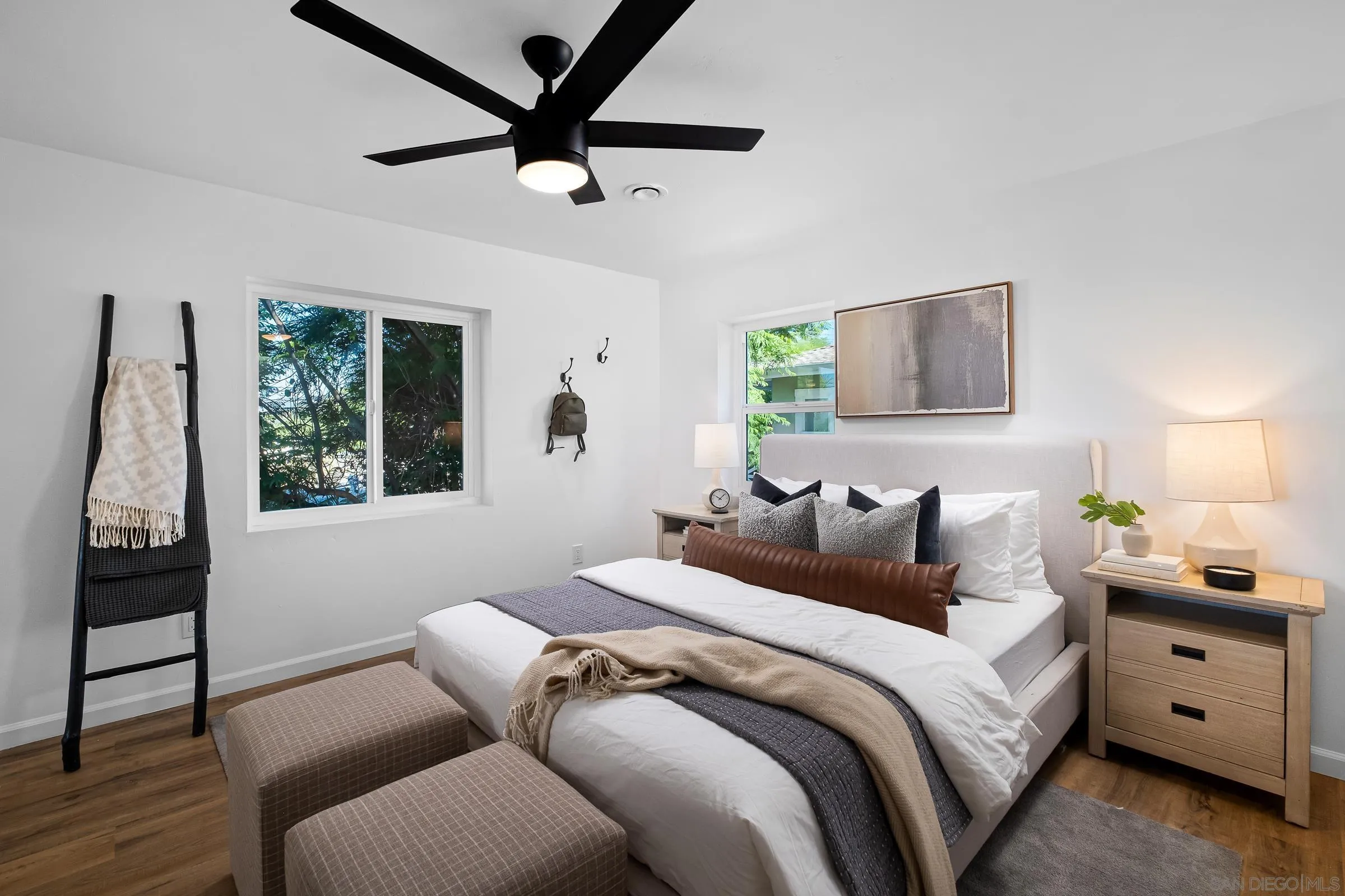 8726 Almond Road Lakeside, CA 92040 - Photo 24 of 31 a bedroom with bed window and couch