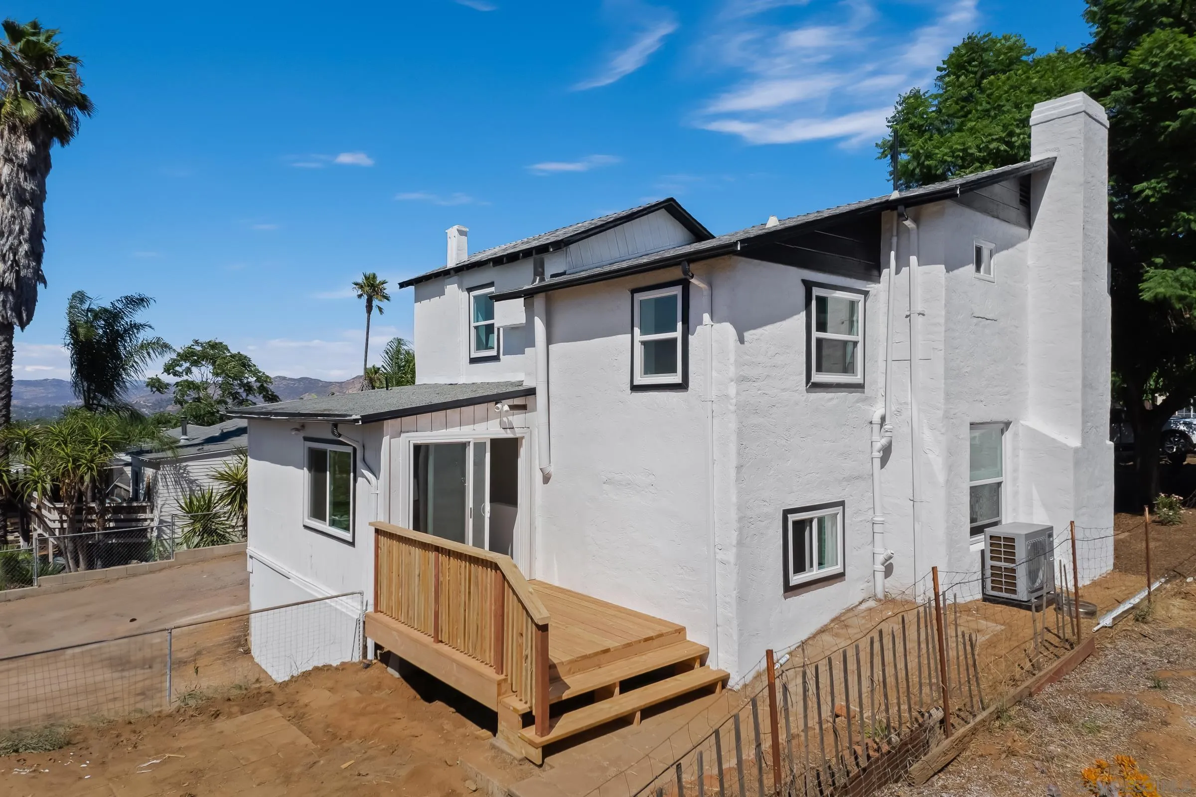 8726 Almond Road Lakeside, CA 92040 - Photo 26 of 31 a view of house with a yard and deck