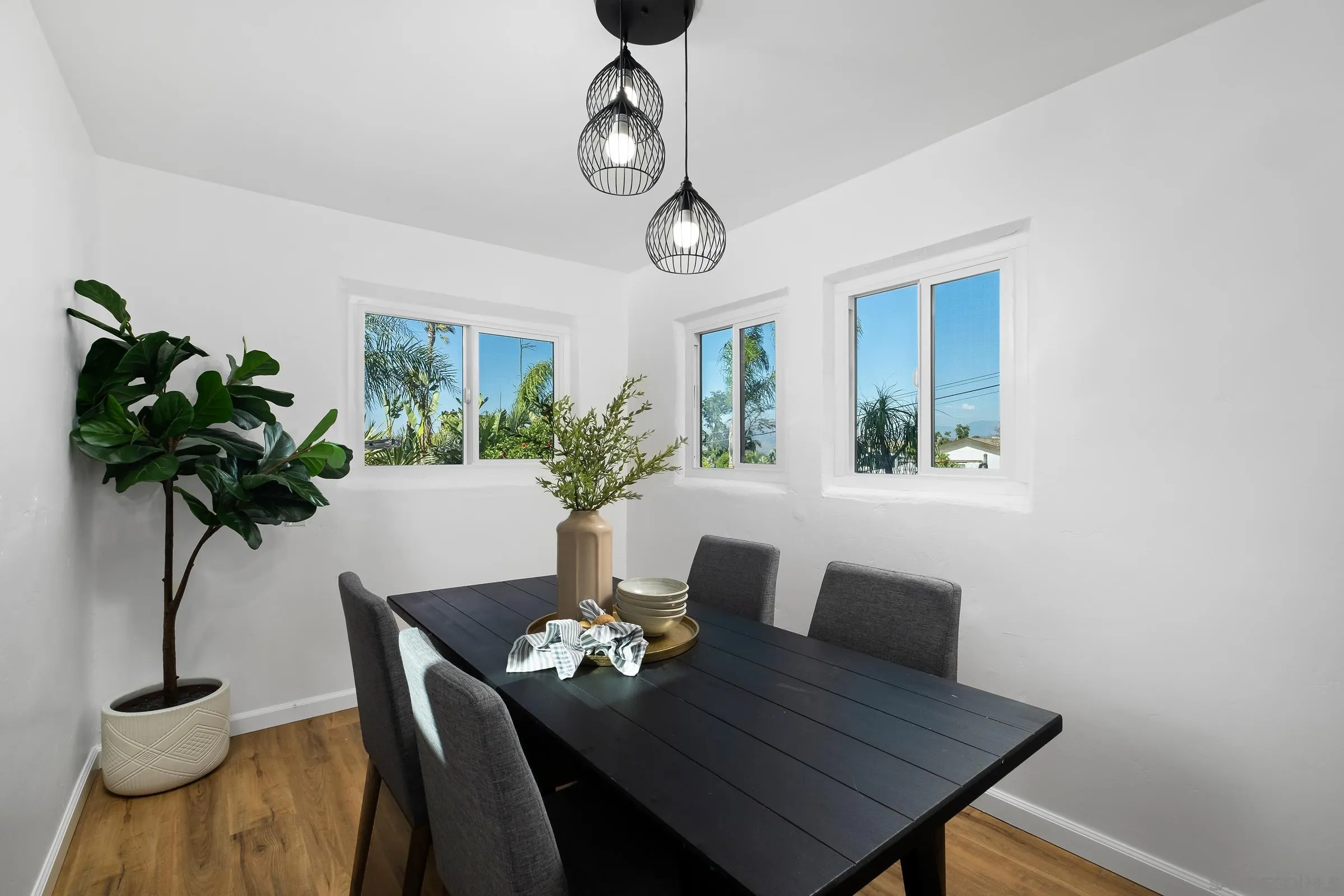 8726 Almond Road Lakeside, CA 92040 - Photo 8 of 31 a view of a dining room with furniture window and wooden floor