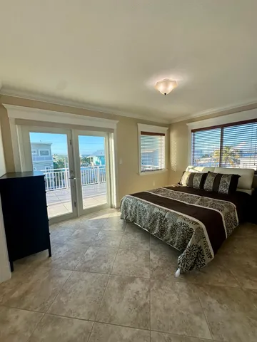 a view of gallery with wooden floor