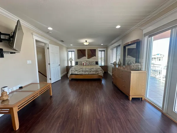 a view of a swimming pool and an outdoor seating