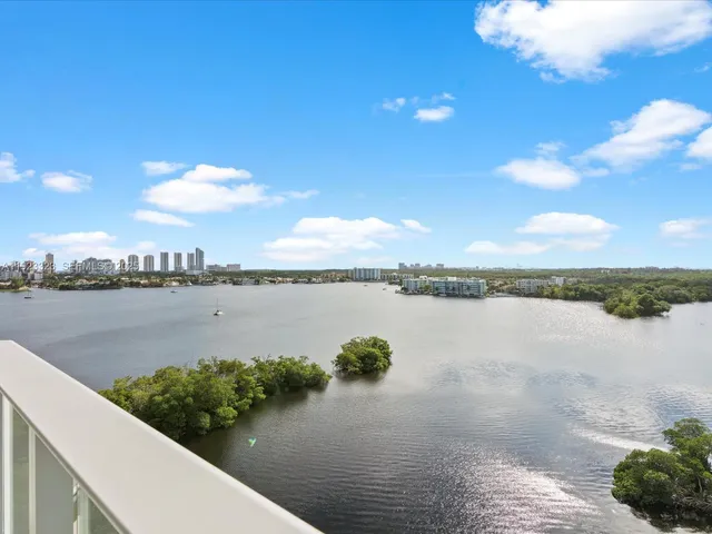 a view of a lake from a balcony
