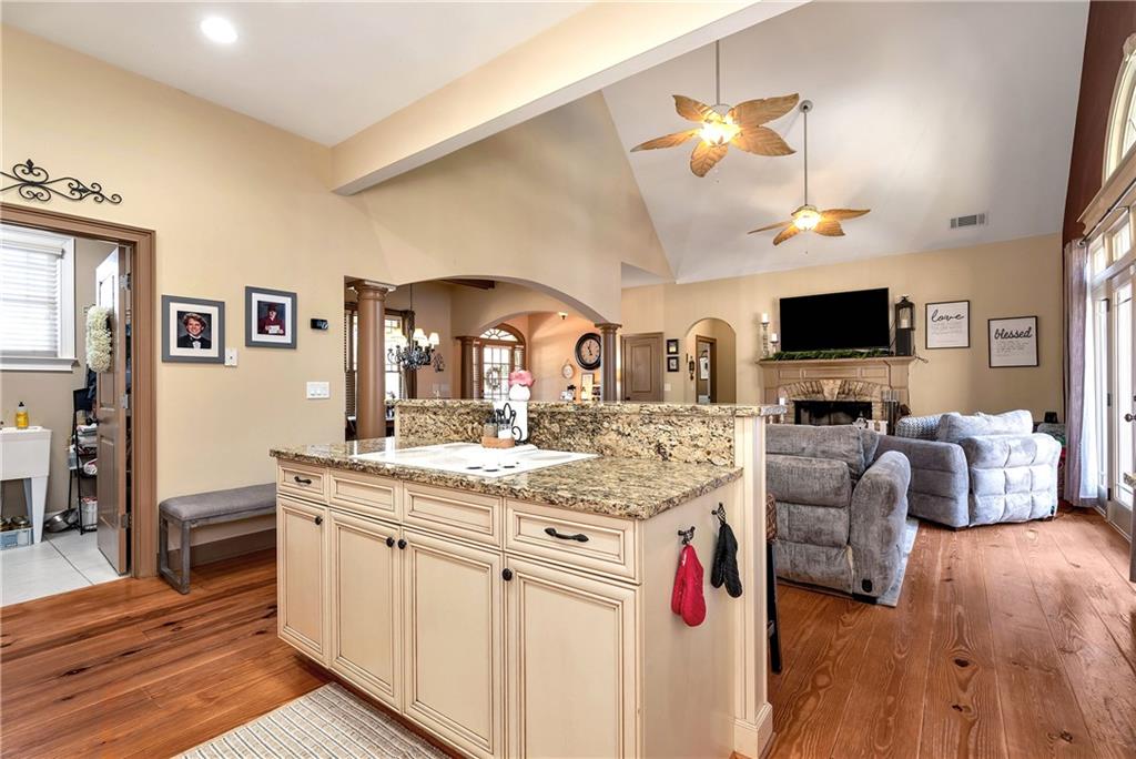 321 Chumbley Road Dawsonville, GA 30534 - Photo 17 of 65 a view of living room with granite countertop furniture and fireplace