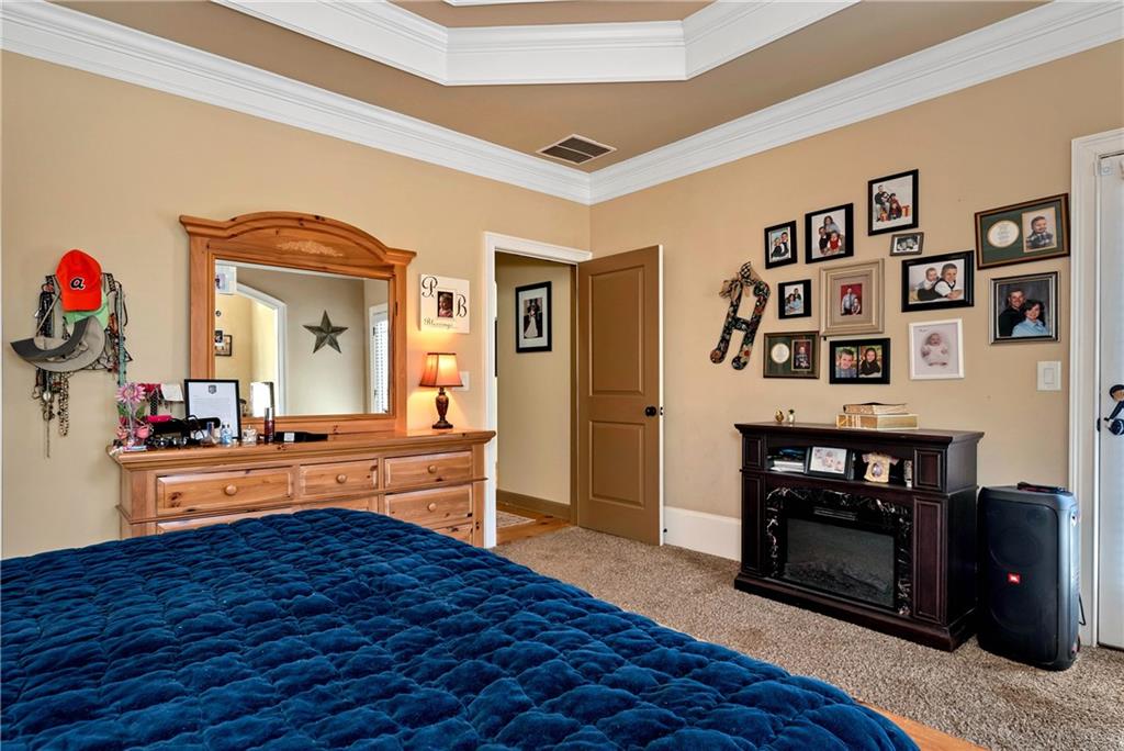 321 Chumbley Road Dawsonville, GA 30534 - Photo 22 of 65 a kitchen with a refrigerator and a stove top oven