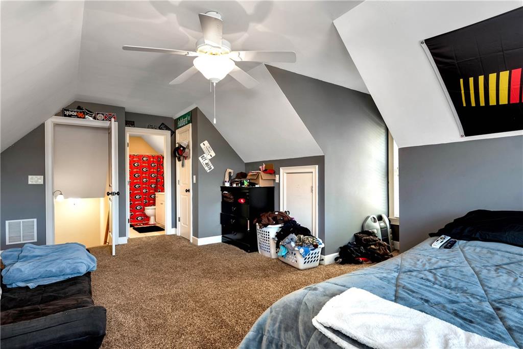 321 Chumbley Road Dawsonville, GA 30534 - Photo 33 of 65 a bed room with a bed and a closet