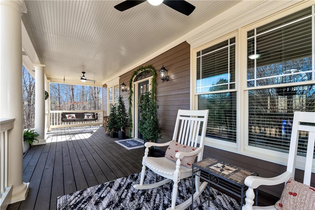 321 Chumbley Road Dawsonville, GA 30534 - Photo 4 of 65 a outdoor space with lots of furniture and wooden floor