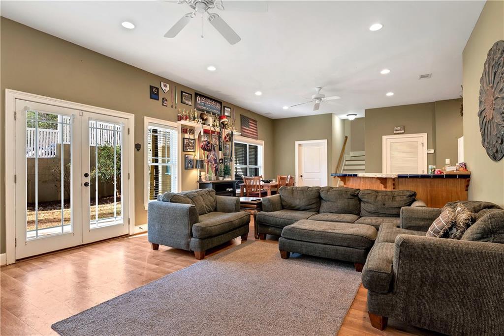 321 Chumbley Road Dawsonville, GA 30534 - Photo 41 of 65 a living room with furniture and a large window