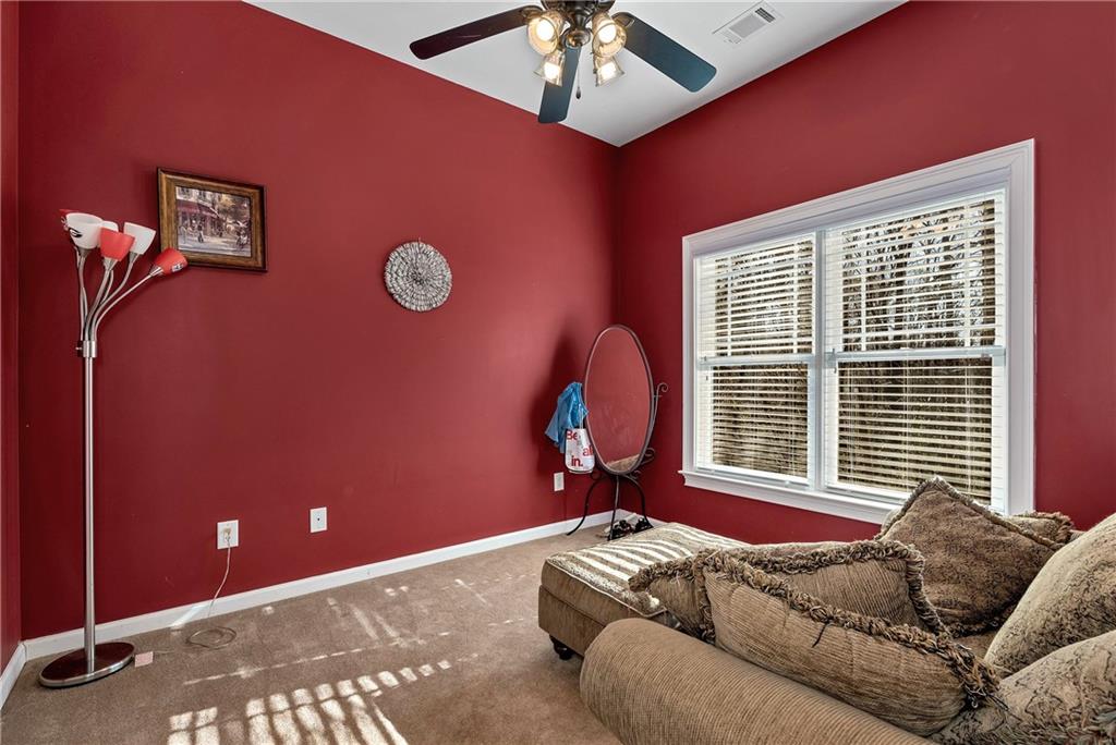 321 Chumbley Road Dawsonville, GA 30534 - Photo 42 of 65 a living room with furniture and a window