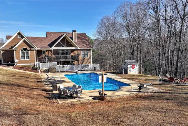 a view of a swimming pool with an ocean view