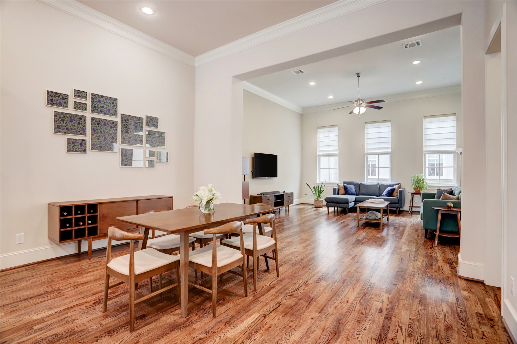 1348 West 25th Street Houston, TX 77008 - Photo 15 of 34 a view of a dining room with furniture and wooden floor