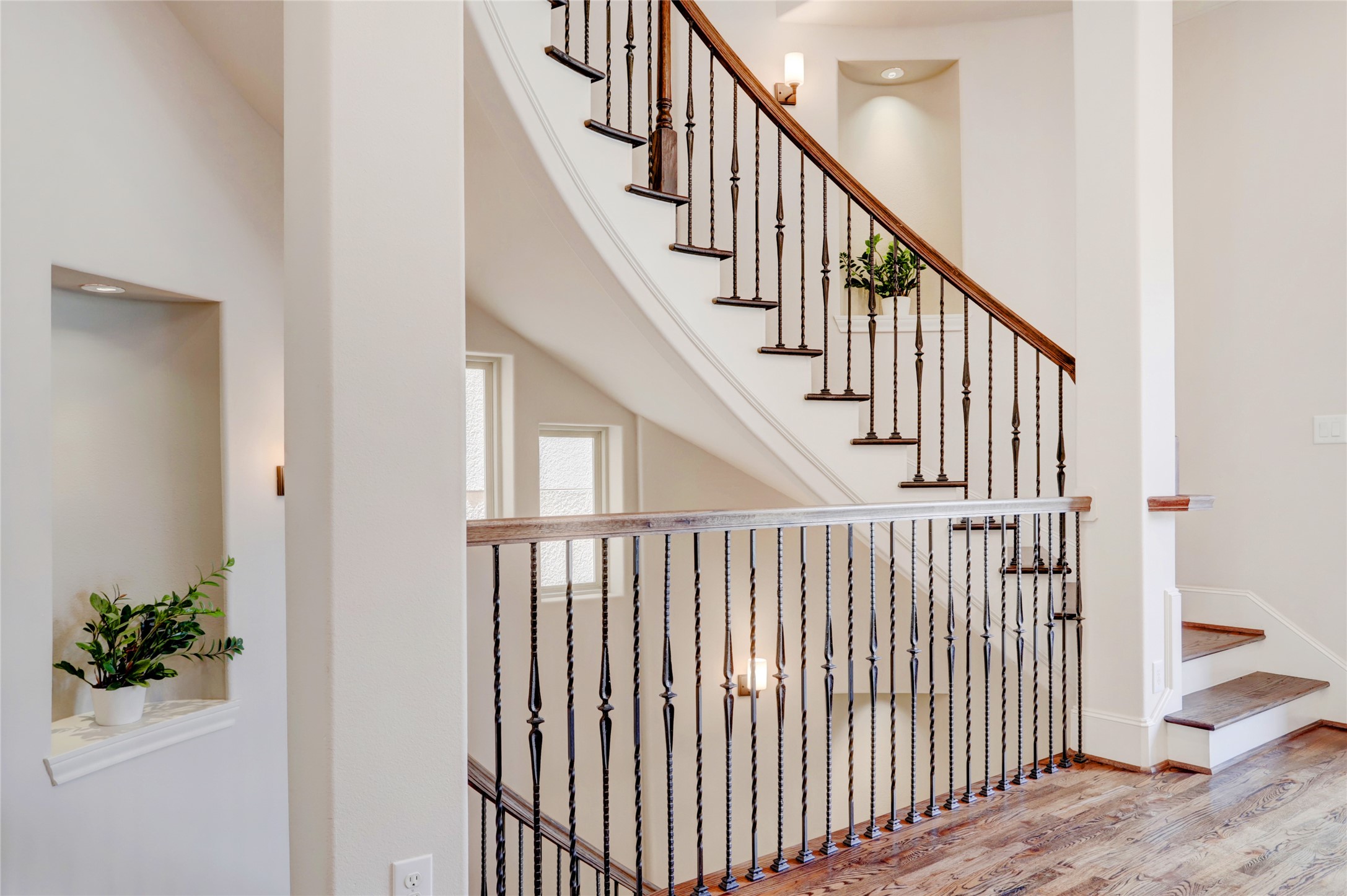 1348 West 25th Street Houston, TX 77008 - Photo 20 of 34 a view of staircase with railing and white walls