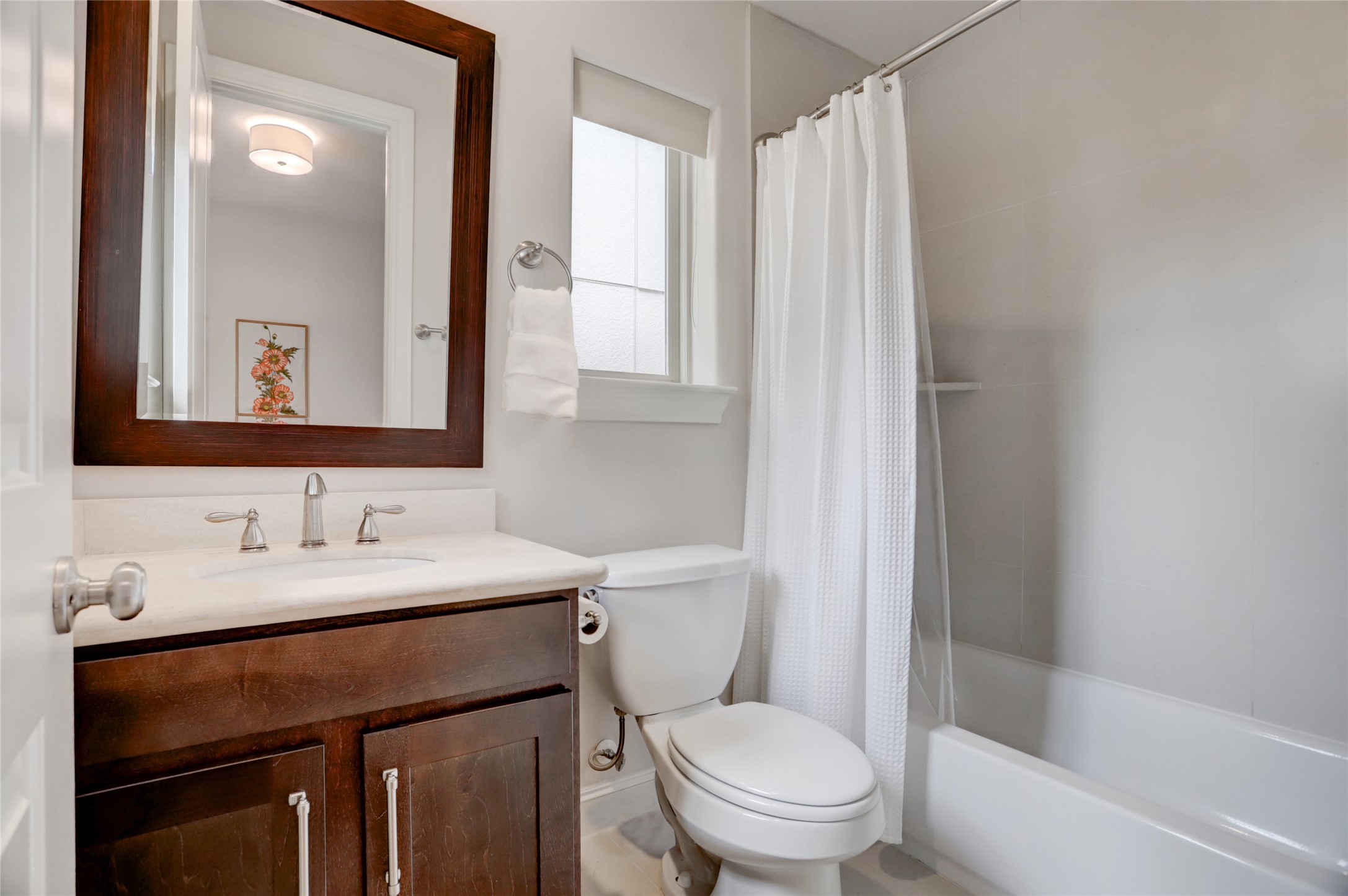 1348 West 25th Street Houston, TX 77008 - Photo 28 of 34 a bathroom with a sink a toilet and shower
