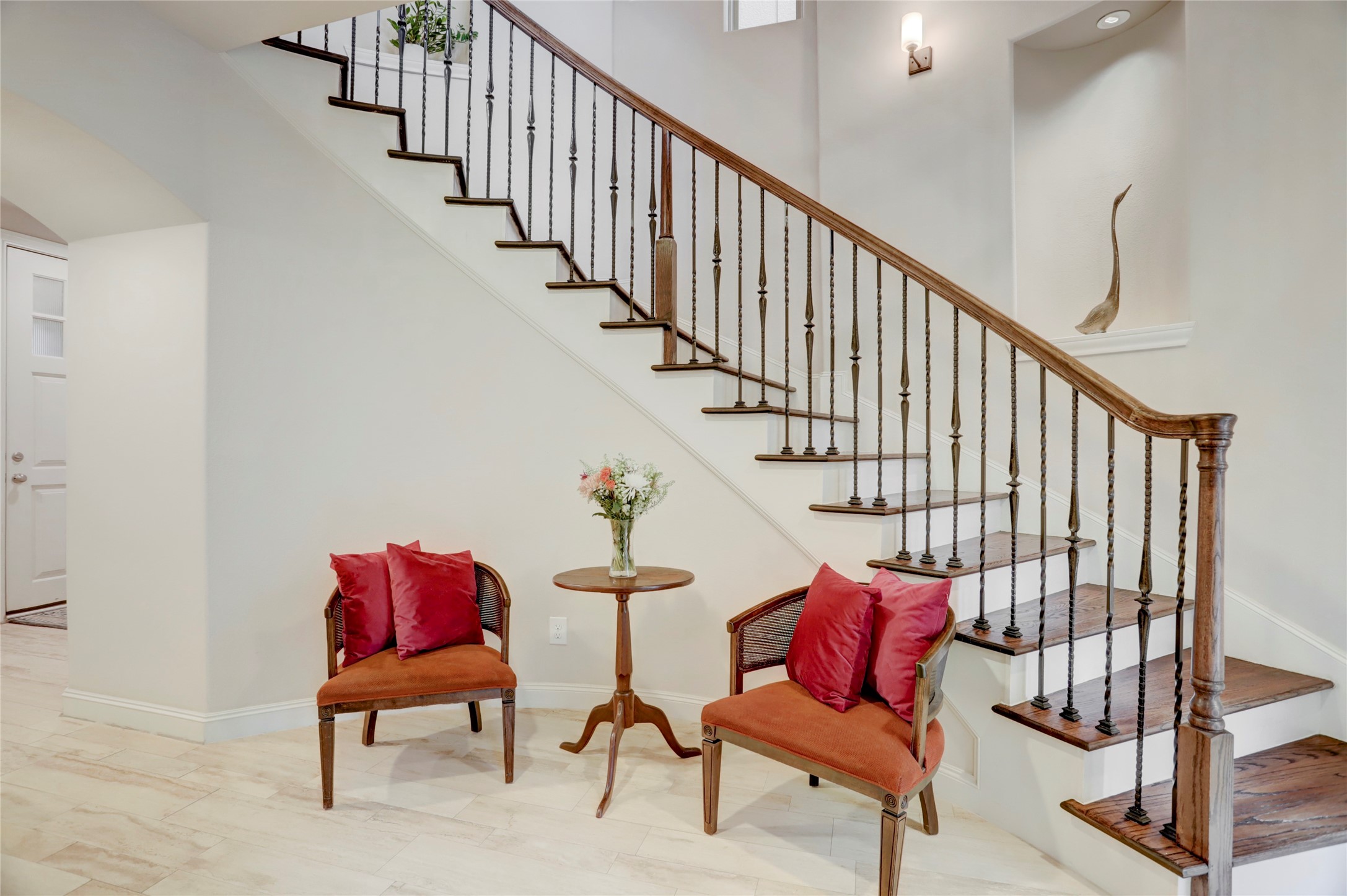 1348 West 25th Street Houston, TX 77008 - Photo 3 of 34 a view of staircase with furniture and stairs