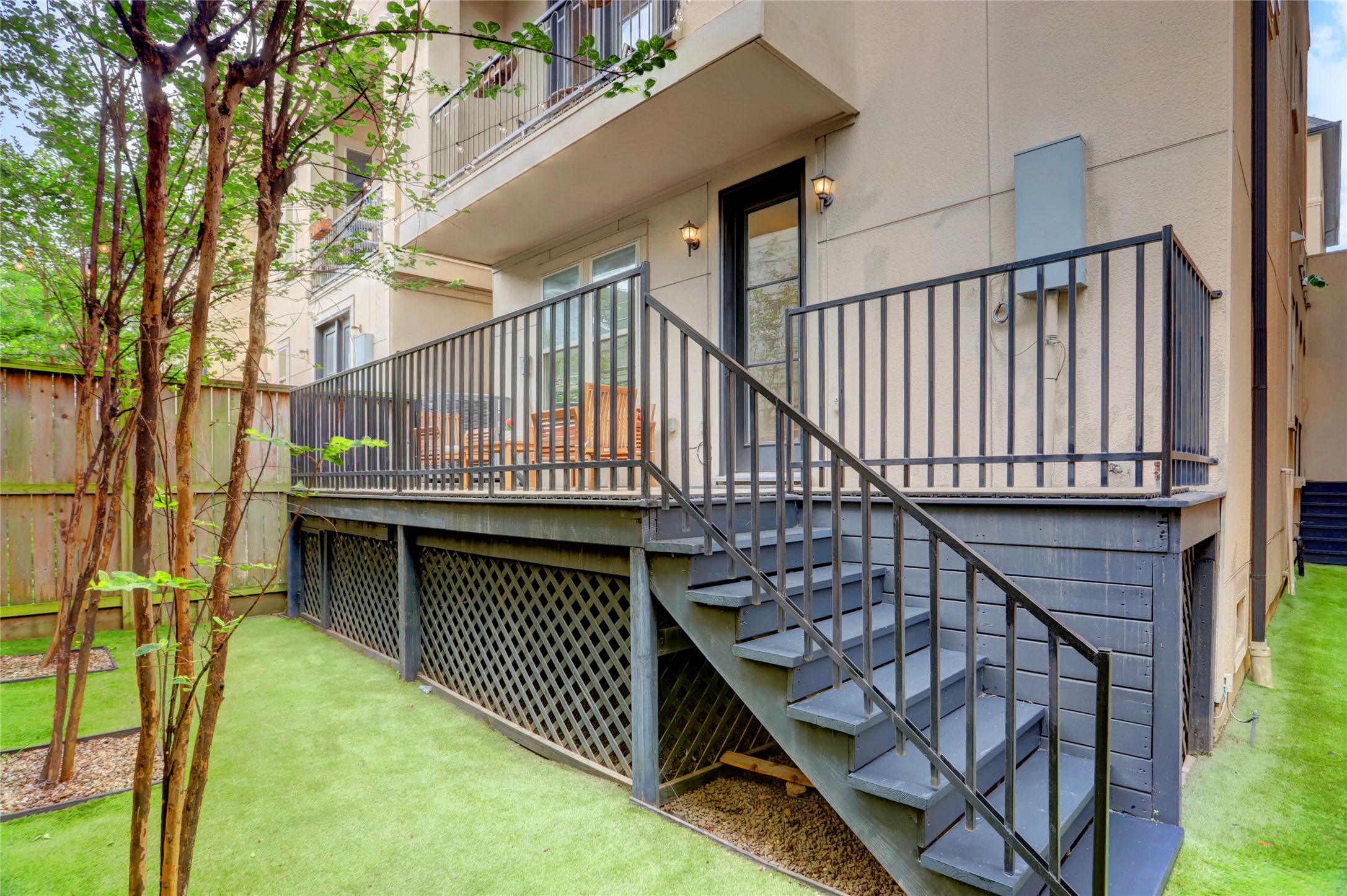1348 West 25th Street Houston, TX 77008 - Photo 7 of 34 a balcony with wooden floor and furniture