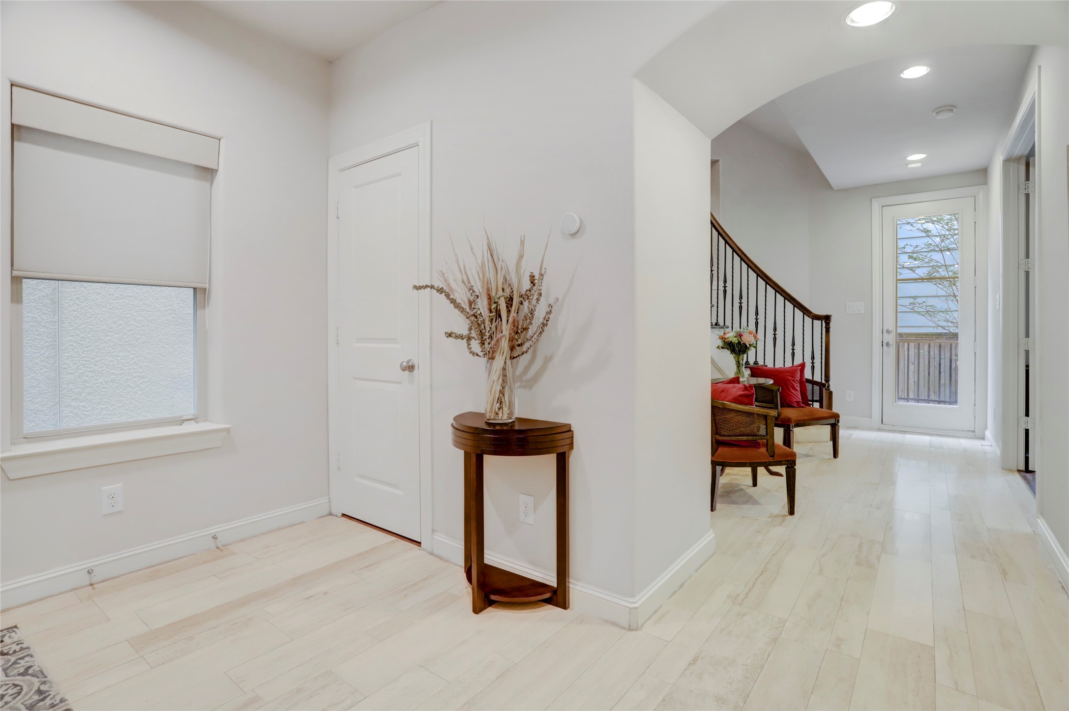 1348 West 25th Street Houston, TX 77008 - Photo 9 of 34 wooden floor with table and a potted plant