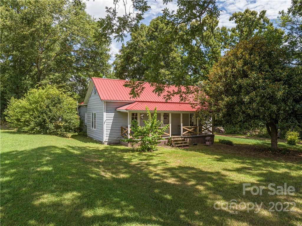 1212 Tot Dellinger Road Cherryville, NC 28021 - Photo 1 of 46 a view of a house with a yard