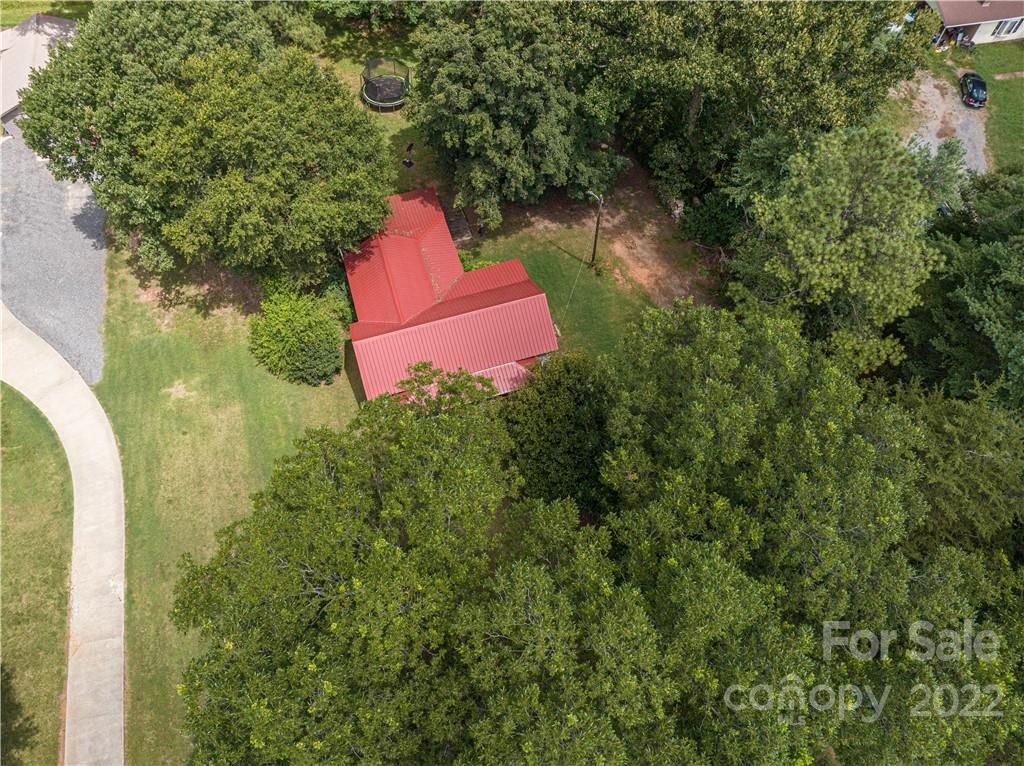 1212 Tot Dellinger Road Cherryville, NC 28021 - Photo 28 of 46 an aerial view of a house with a yard and lake view