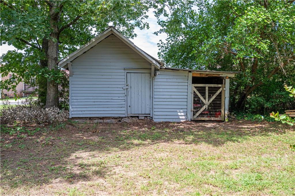 1212 Tot Dellinger Road Cherryville, NC 28021 - Photo 35 of 46 a view of a house with a yard