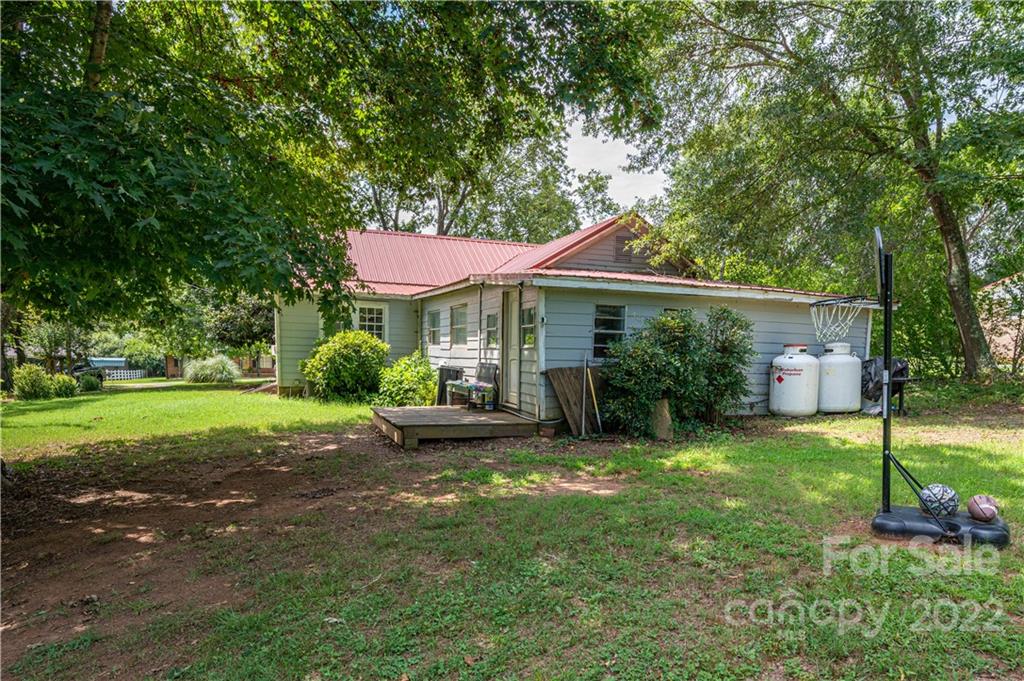 1212 Tot Dellinger Road Cherryville, NC 28021 - Photo 36 of 46 a front view of a house with a yard