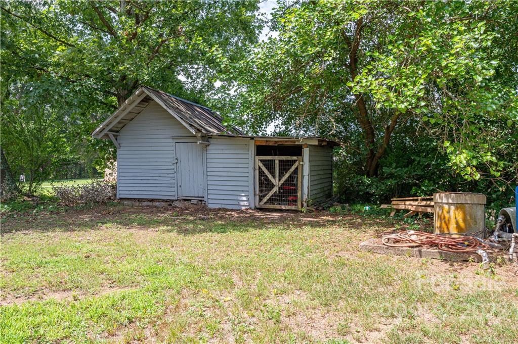 1212 Tot Dellinger Road Cherryville, NC 28021 - Photo 39 of 46 a view of house with backyard space and garden