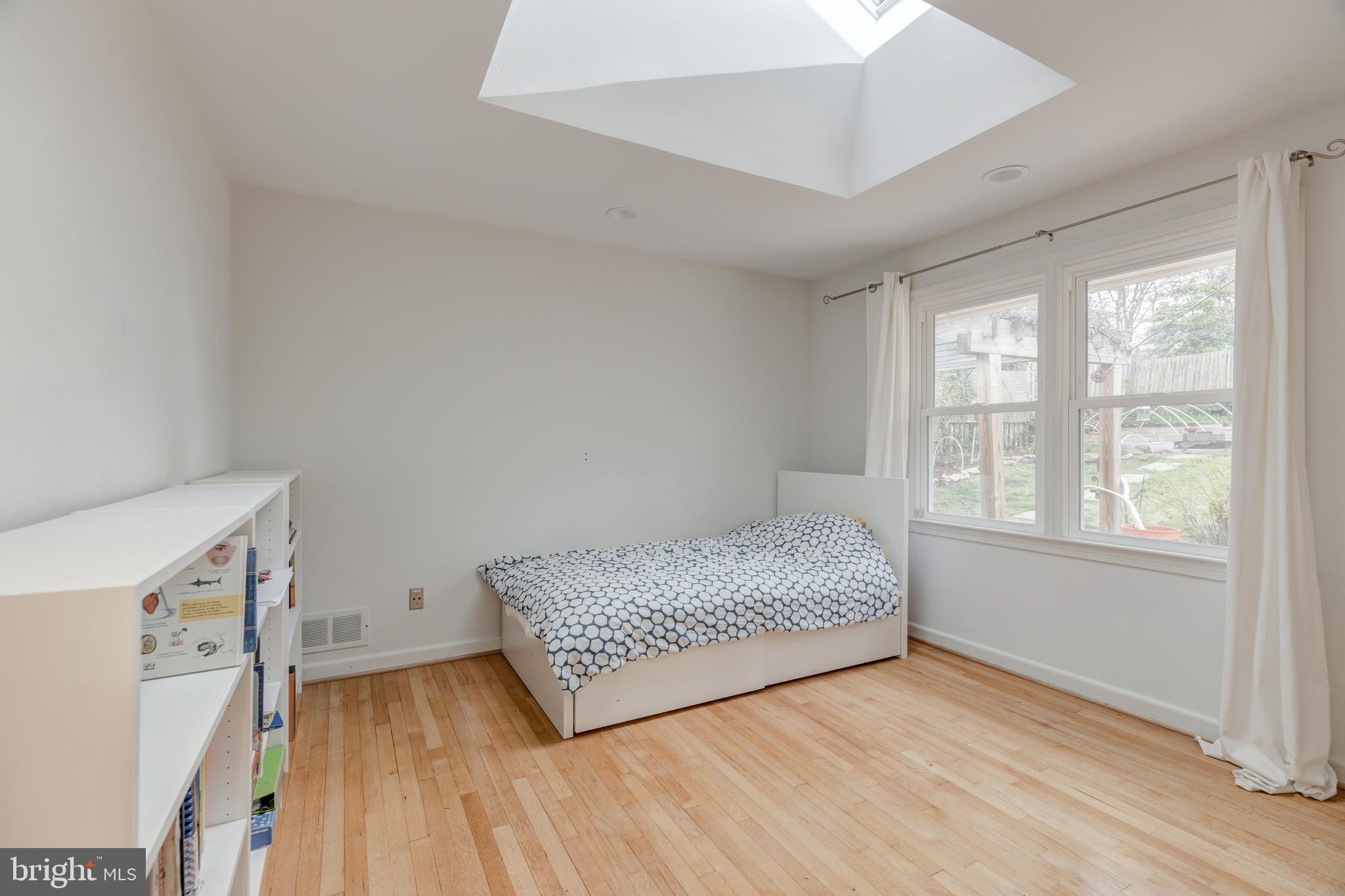 6113 Walhonding Road Bethesda, MD 20816 - Photo 15 of 26 Third bedroom with skylight