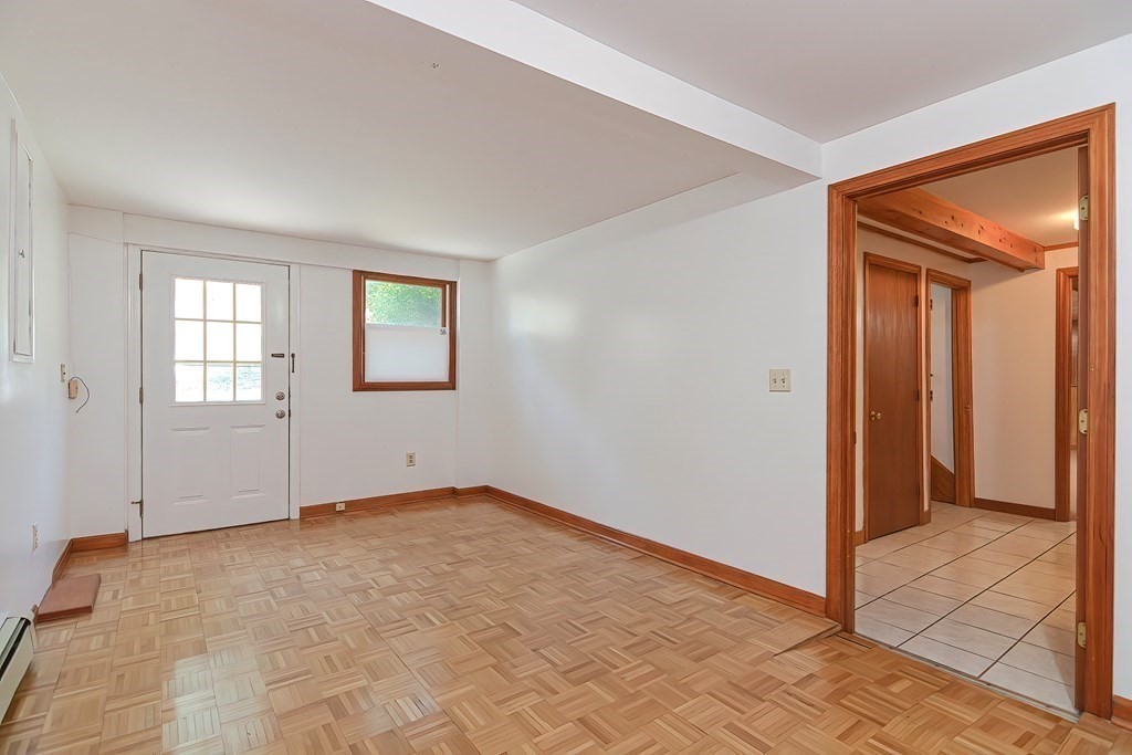 49 Hadwen Road Worcester, MA 01602 - Photo 24 of 28 an empty room with windows and closet