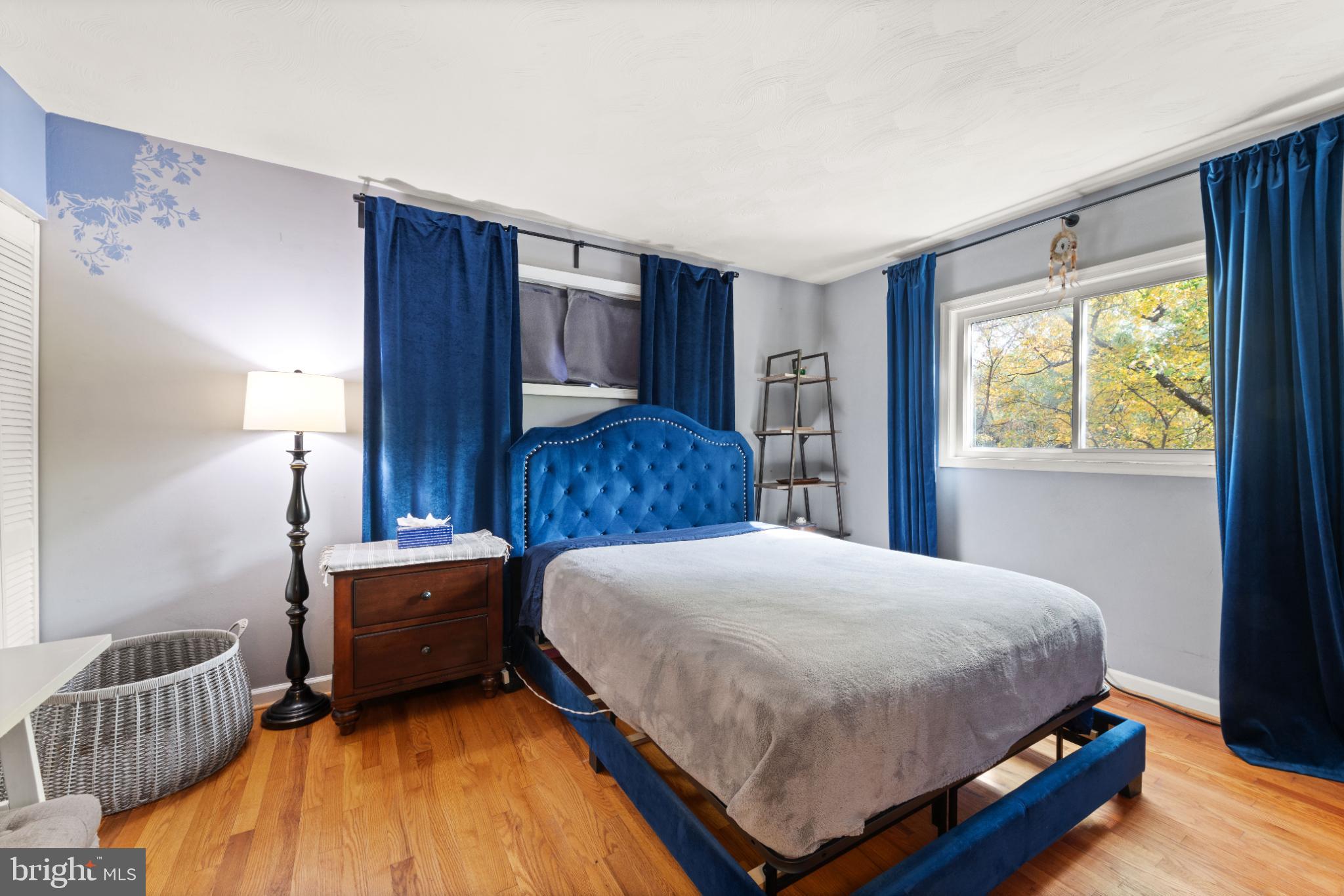 3700 Ralph Road Silver Spring, MD 20906 - Photo 19 of 30 Serene bedroom with vibrant blue accents.