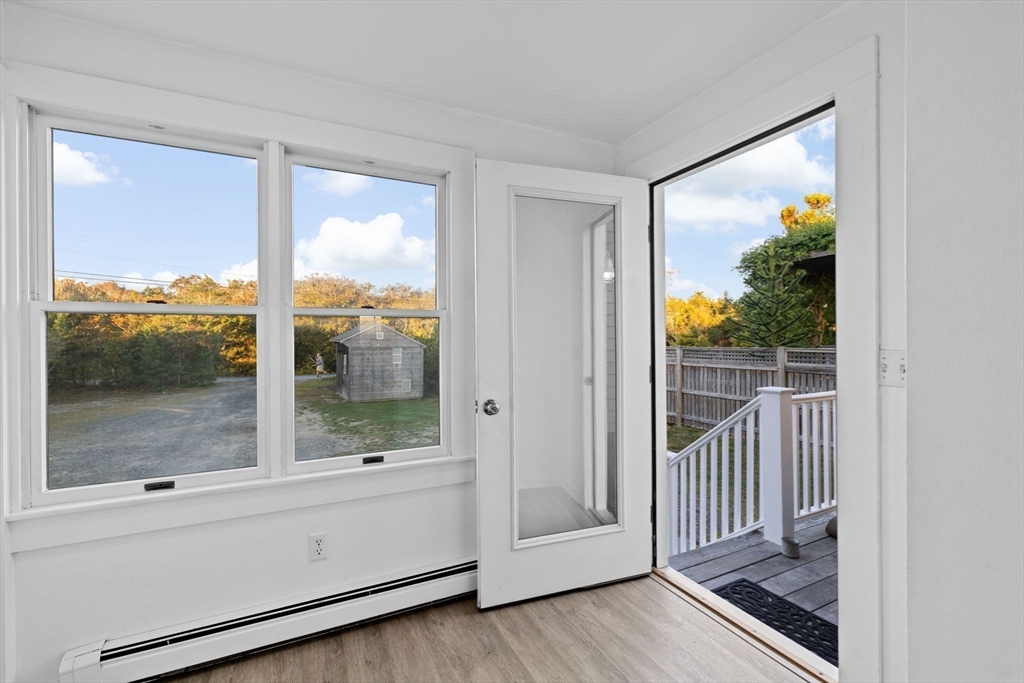 133 Phillips Road Bourne, MA 02562 - Photo 31 of 42 a view of a glass door with a large window