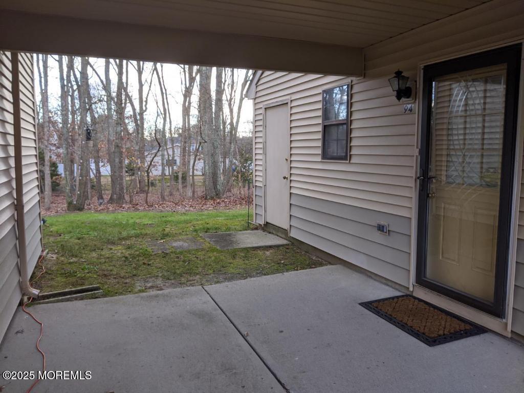 a view of backyard with green space