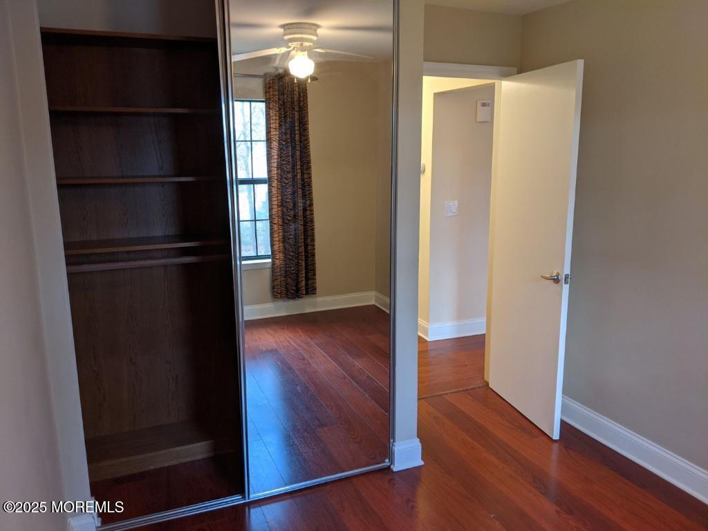 94 Azalea Circle Jackson, NJ 08527 - Photo 18 of 31 a view of walk in closet with wooden floor