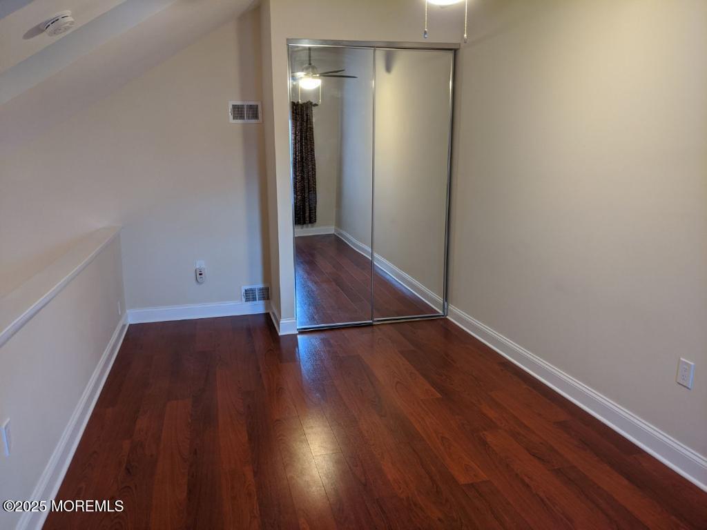 94 Azalea Circle Jackson, NJ 08527 - Photo 24 of 31 an empty room with wooden floor